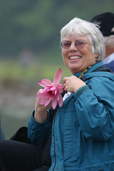 Mom gets a water lily lei.