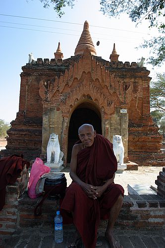 Monk outside a zedi.