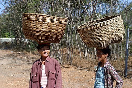 Big baskets on little women.