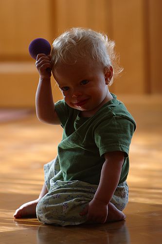 Zeke playing with a purple snot snorter.