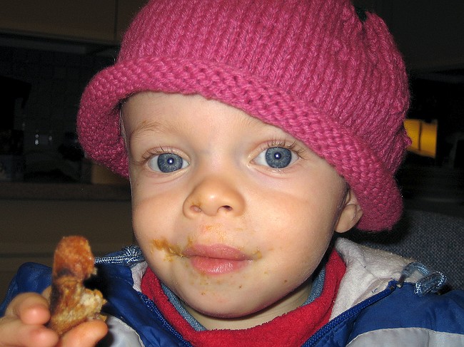 Zeke eats some peanut butter.