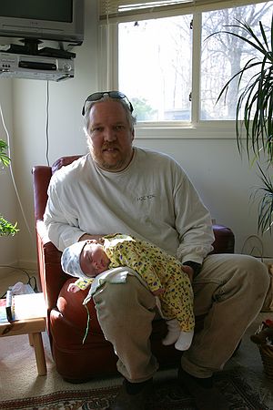 Dad and his sack o' potatoes.